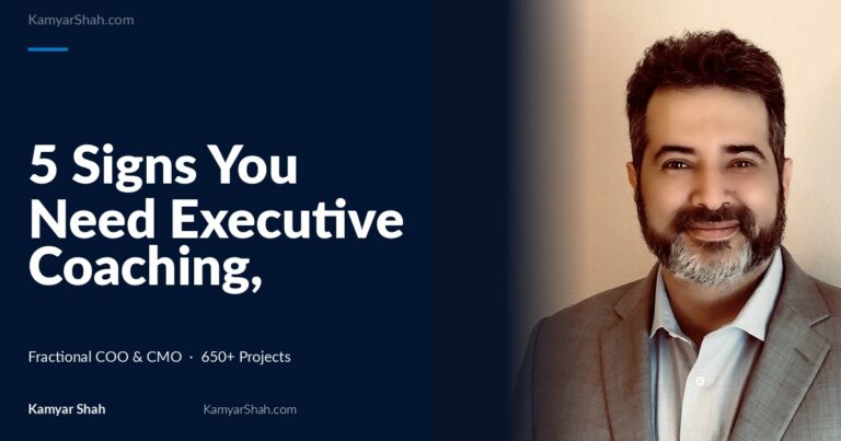 Hero banner: article title '5 Signs You Need Executive Coaching, Not More Strategy' on a dark blue panel beside a man in a gray suit smiling on the right.