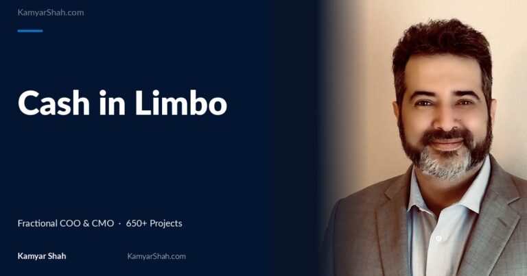 Hero banner: article title 'Cash in Limbo' on a dark blue panel beside a man in a gray suit smiling on the right.