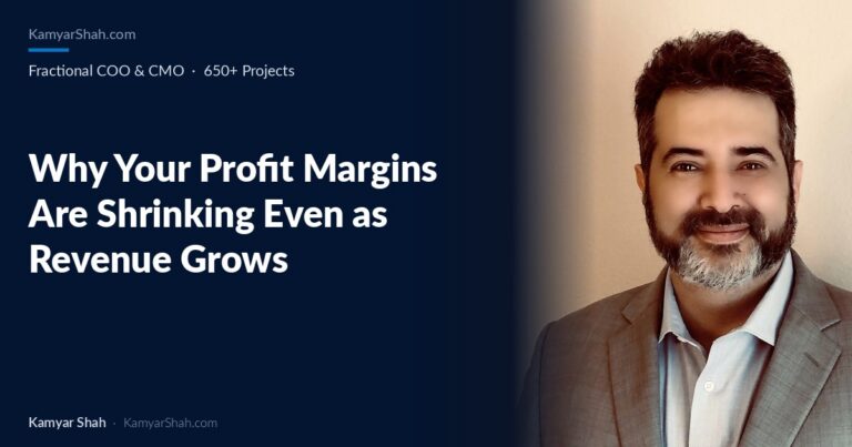 Hero banner: article title 'Why Your Profit Margins Are Shrinking Even as Revenue Grows' on a dark blue panel beside a man in a gray suit smiling on the right.